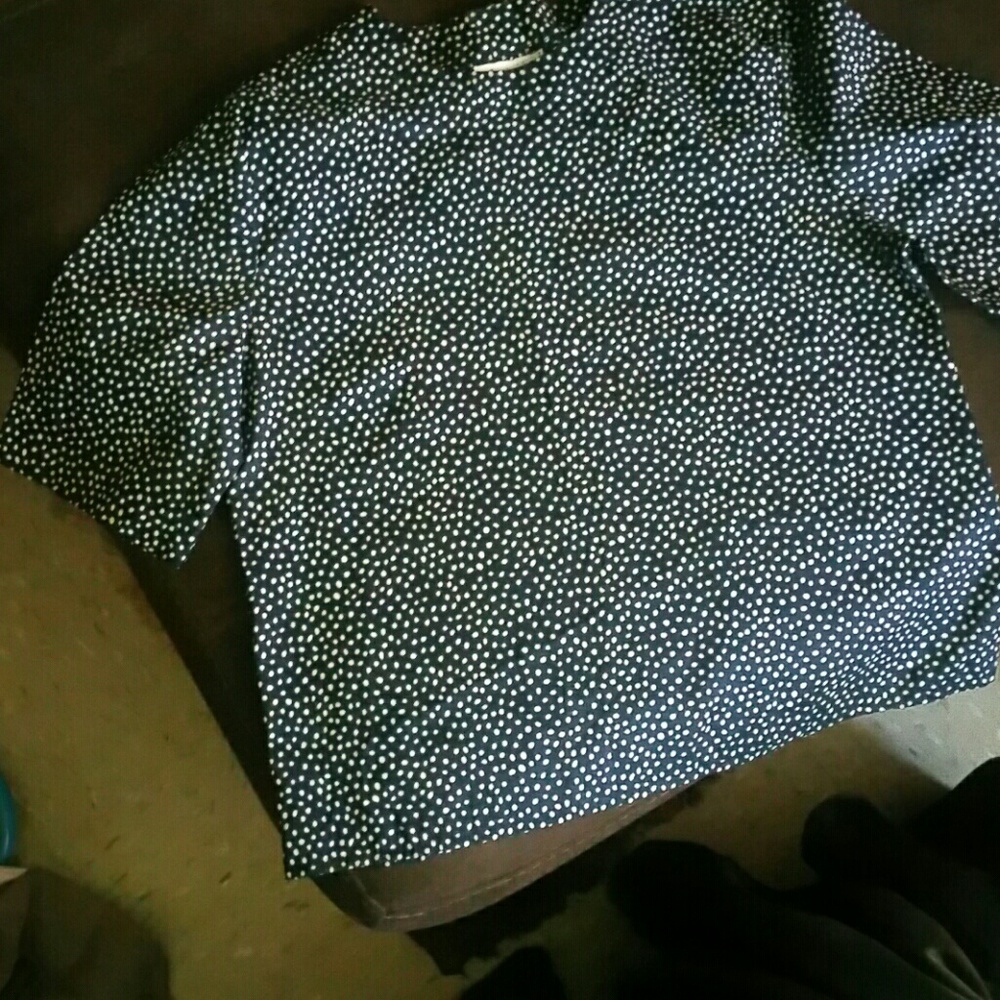 Blue&white blouse with three buttons on the neck..